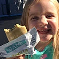 Girl eating sane product