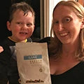 Lady with her baby with sane product pack