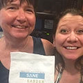 Two Smiling ladies with sane product